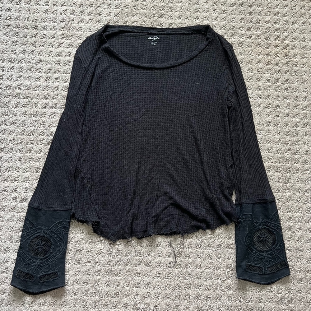 Black sweater top with lace detail on sleeves